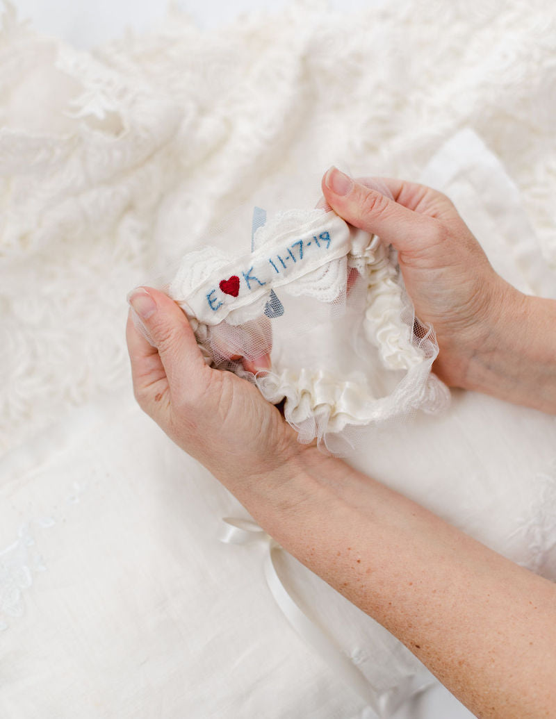 custom wedding garter and ring pillow made from mother's dress and grandmother's handkerchief