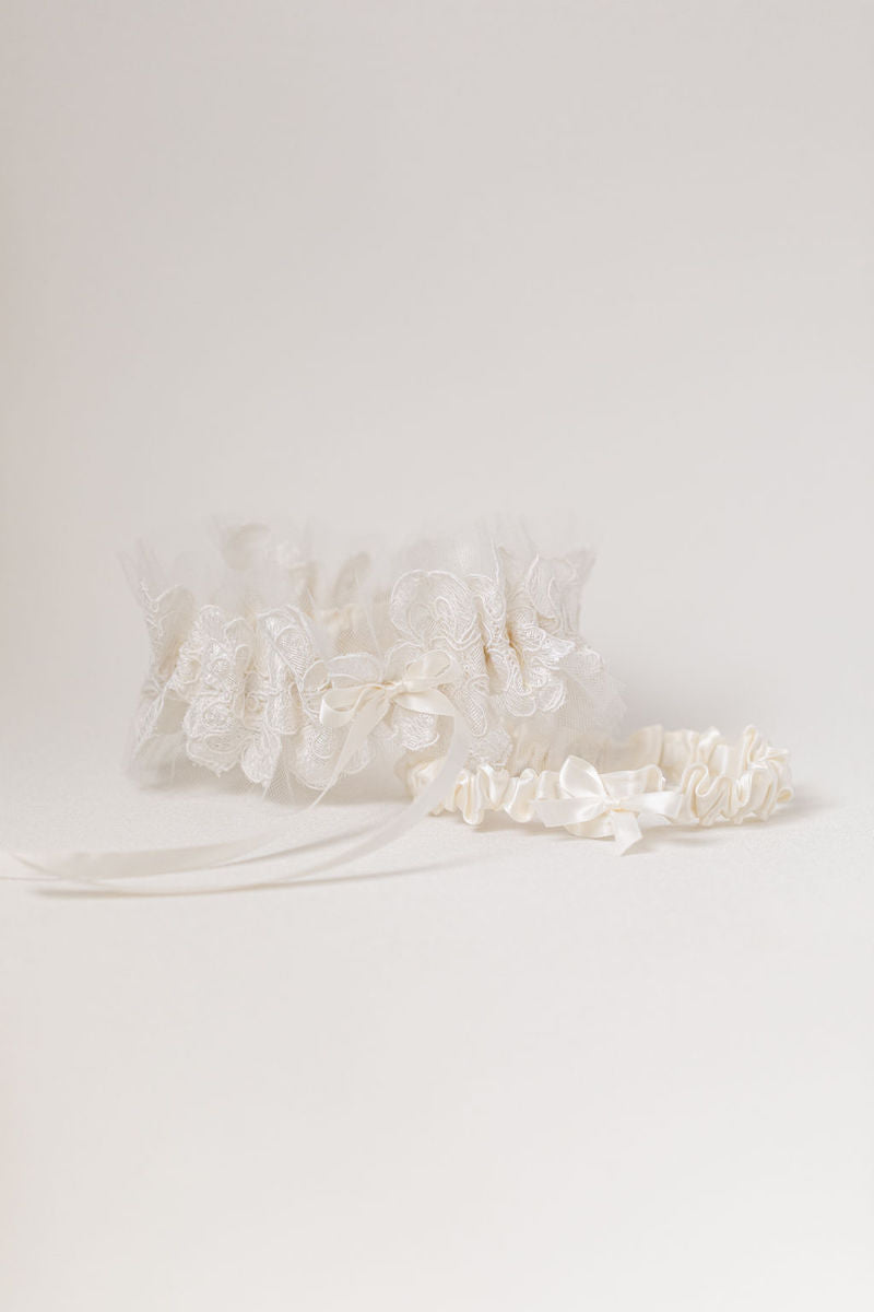 custom wedding garter made from the bride's mother's wedding dress and veil