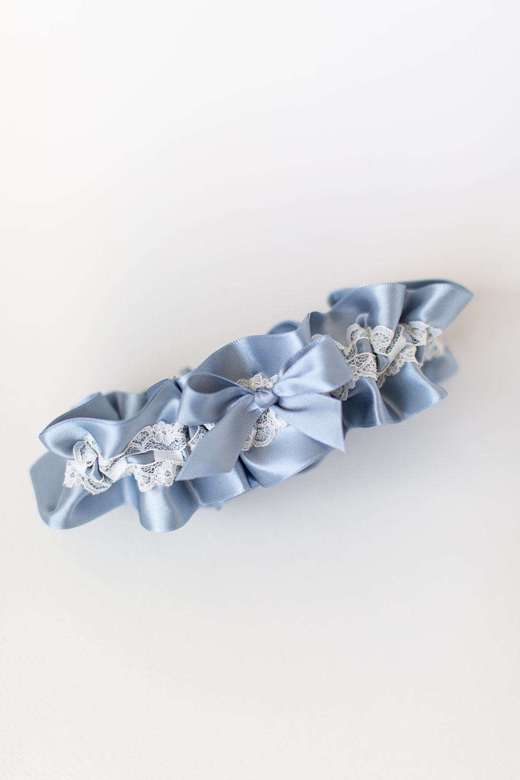 custom garter with dusty blue and ivory lace
