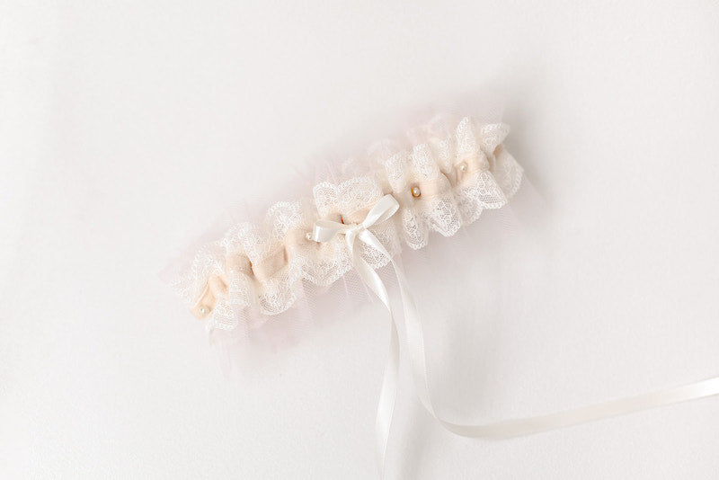 custom garter with blush tulle, velvet, pearls and hand embroidered on the inside by The Garter Girl