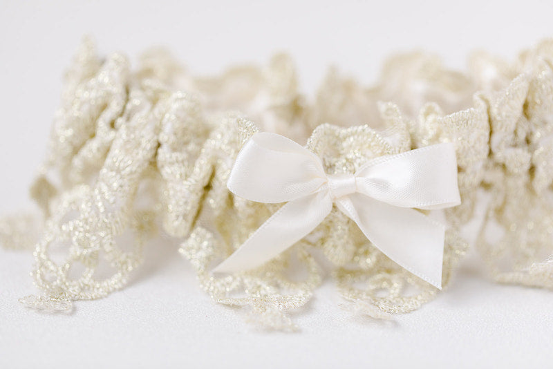 custom heirloom garter with gold lace and ivory satin