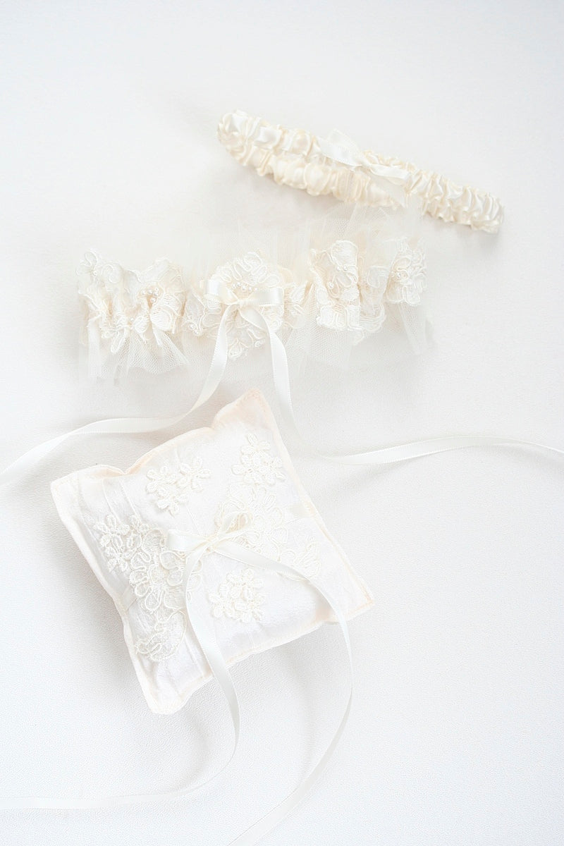 ring pillow and garter set made from mother's wedding dress