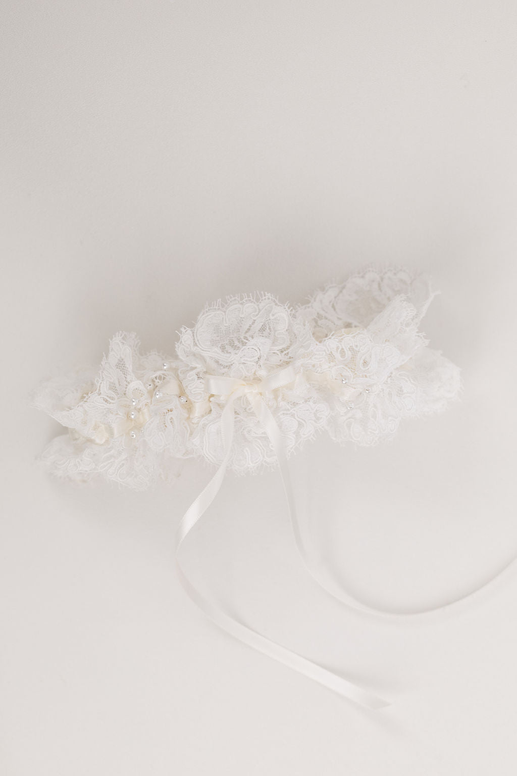 heirloom wedding garter hand made from the bride's mother's wedding dress by The Garter Girl