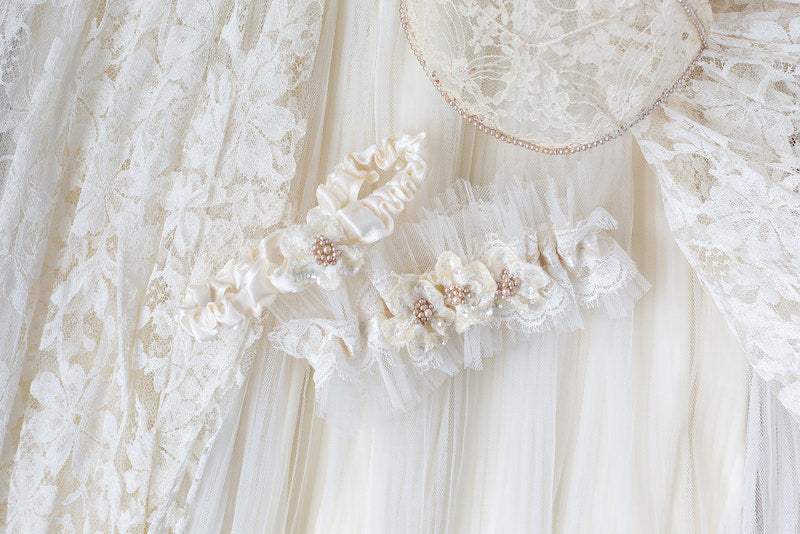 custom bridal garter made from the mother's wedding dress