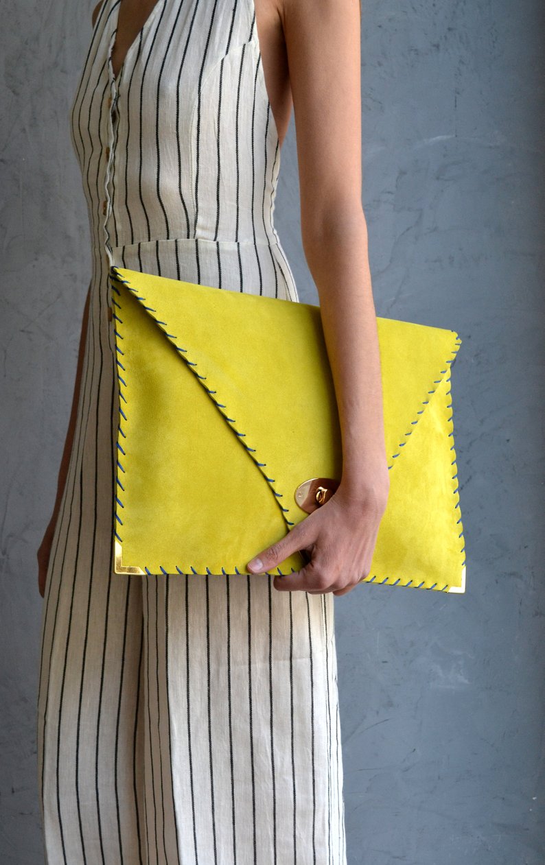 mustard yellow clutch wedding rehearsal dinner outfit accessory 
