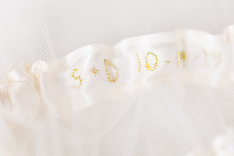 personalized wedding garter with gold wedding date on inside