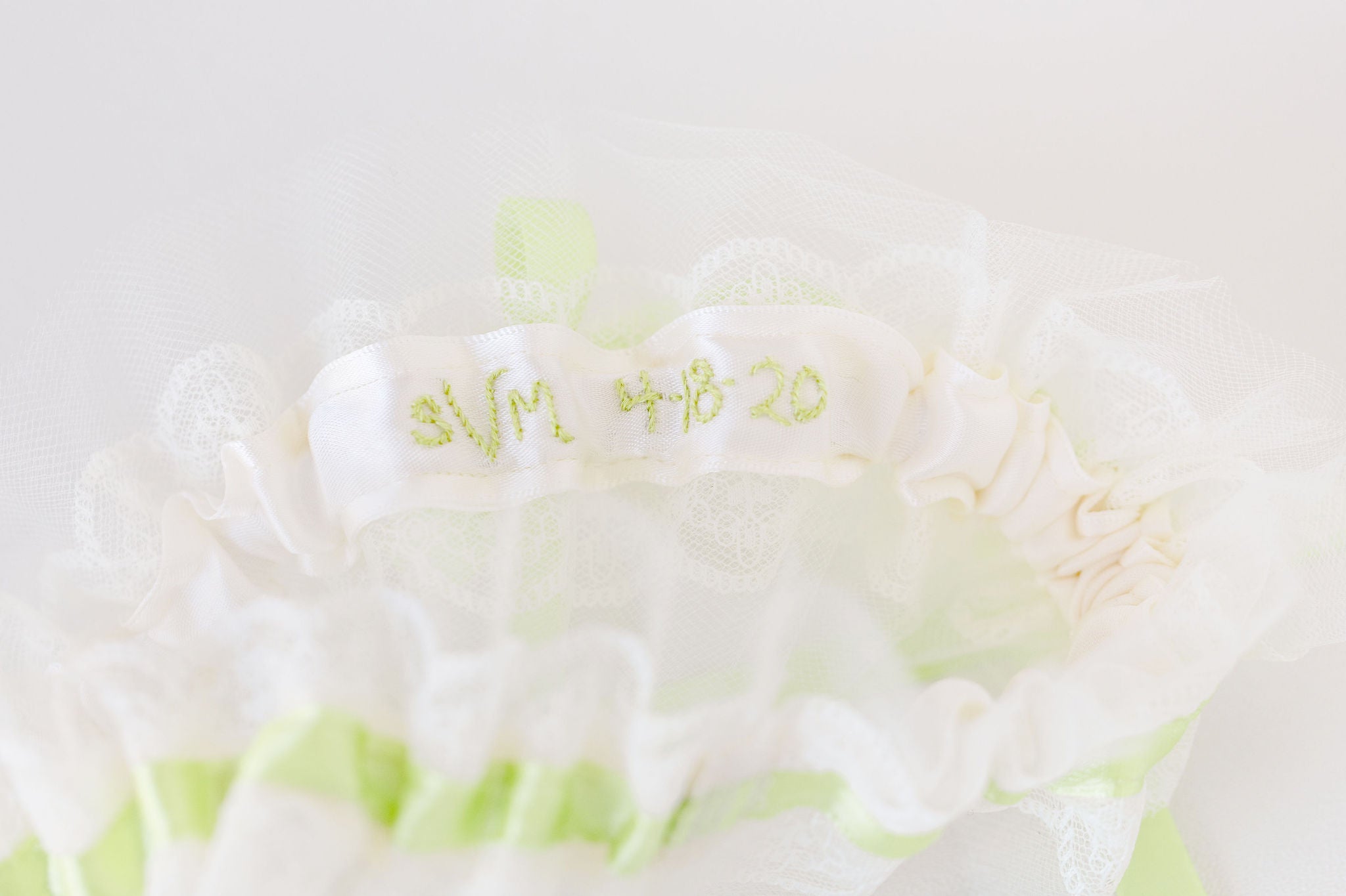 custom wedding garter with pistachio satin, ivory lace & tulle personalized by The Garter Girl