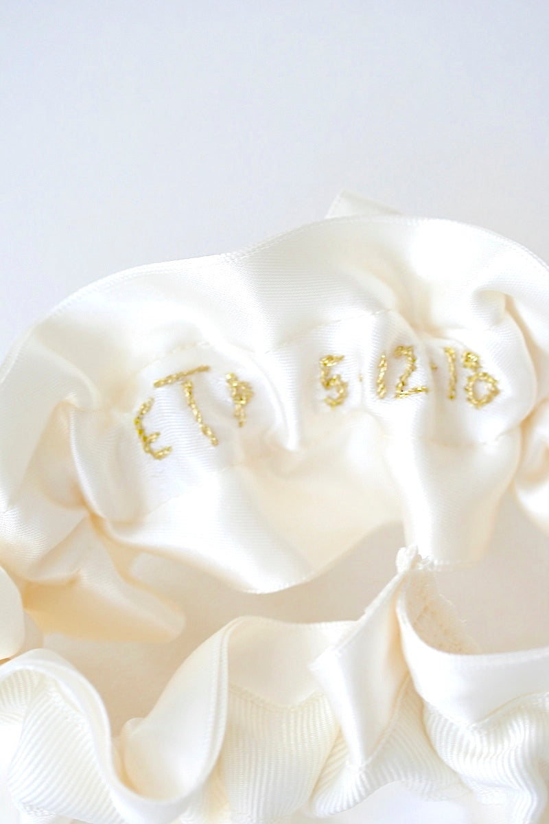 gold embroidery on the inside of custom wedding garter - The Garter Girl