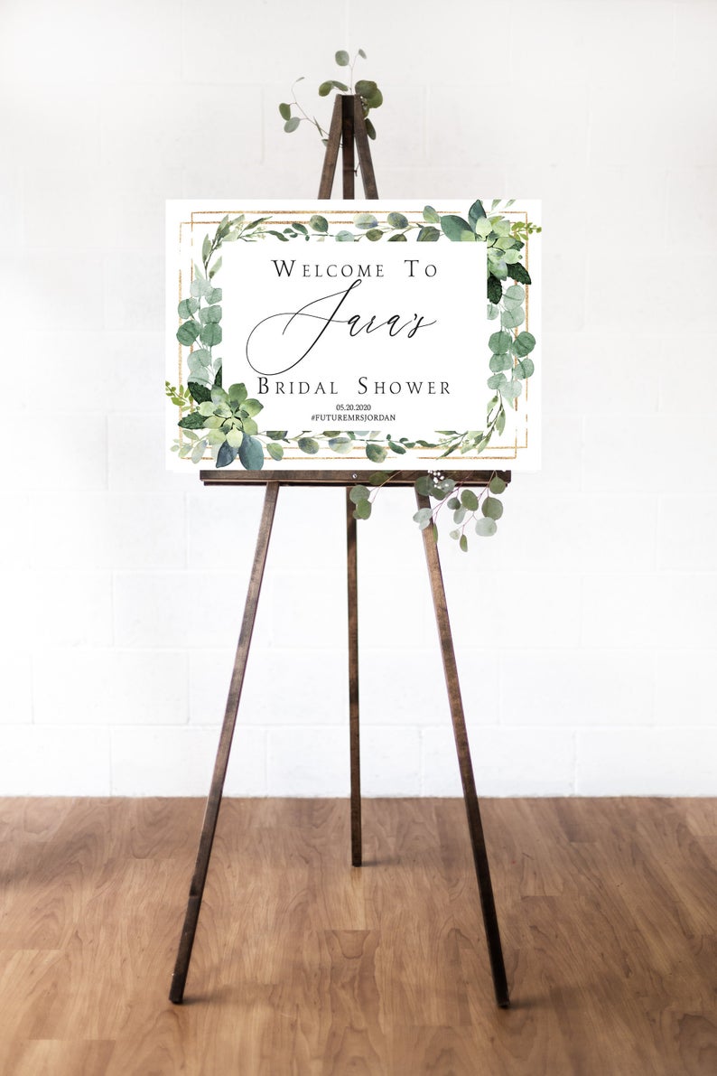 white and floral bridal shower welcome sign