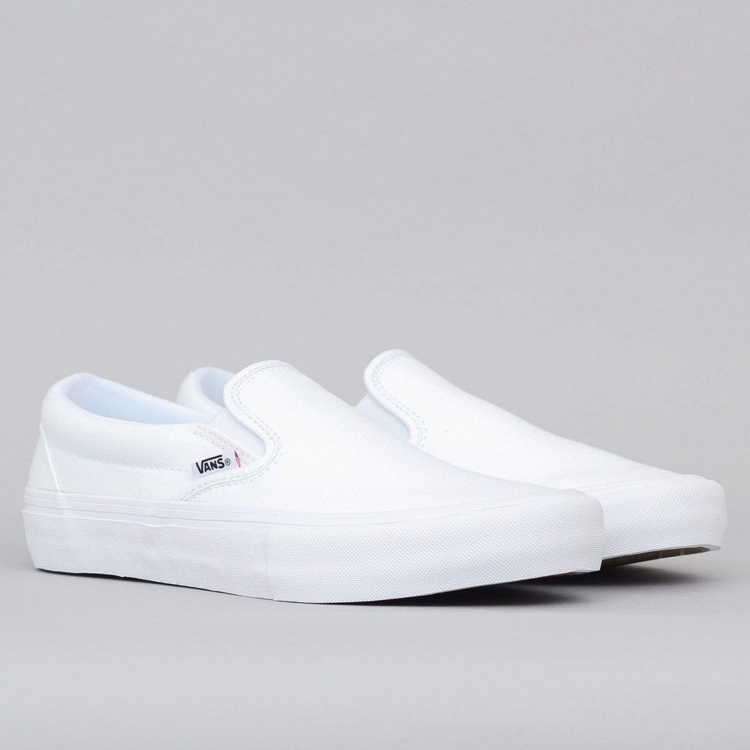 white slip on pro vans