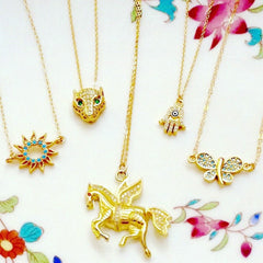 pegasus, butterfly, leopard, hamsa and sun gold and turquoise pendant neckalces