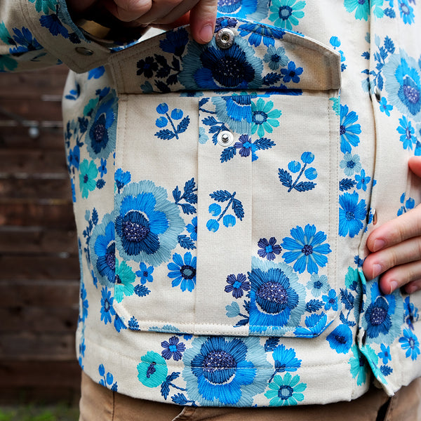 Blue floral jacket, front pocket closeup with flap open