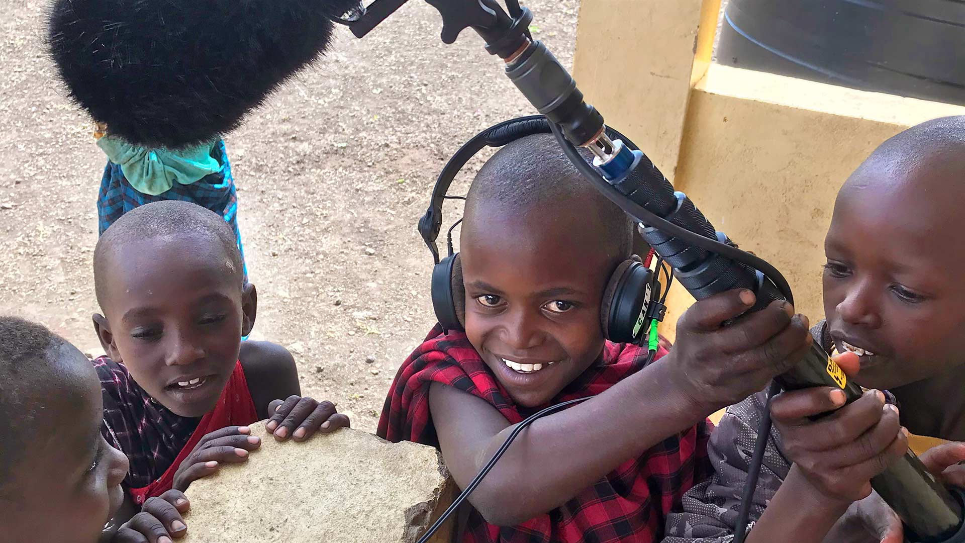 Maasai tribe children listening carefully