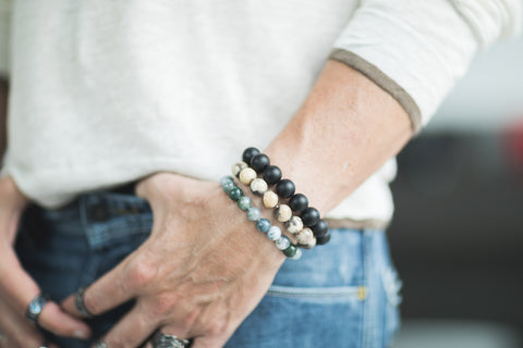 Man wearing three Natural Stone Bracelets