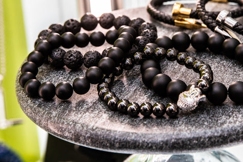 Buddha Natural Stone bracelets on display