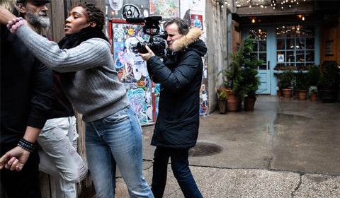 Ebony working behind the scenes of a photoshoot