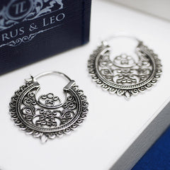 Concordia 925 sterling silver statement earrings.