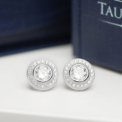 Luceat sterling silver halo studs with white cubic zirconias.