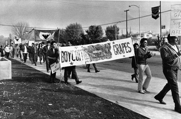 Jose Cortez, a United Farm Workers volunteer, leads a march of 120 people to the Safeway headquarters on Barstow Avenue to protest the selling of table grapes, November 25, 1969. Cortez would go on to serve as a bodyguard to Cesar Chavez. -- Courtesy The Fresno Bee