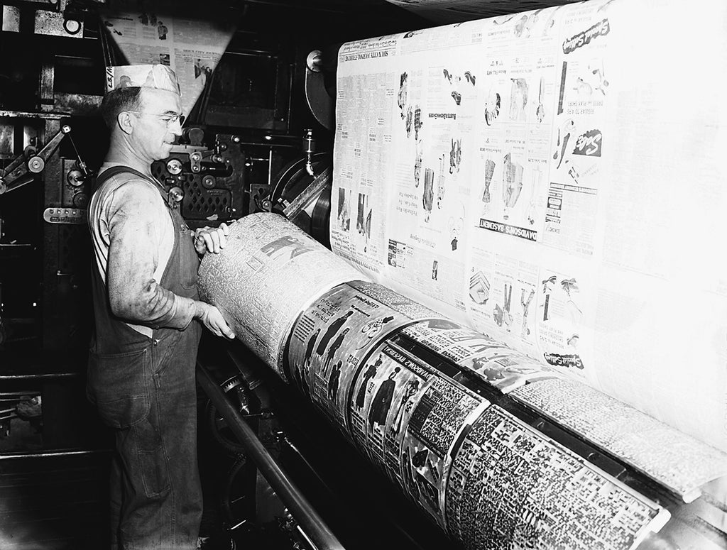 Pressman working with printing plates at the Sioux City Journal-Tribune, August 1946. -- Courtesy Sioux City Public Museum