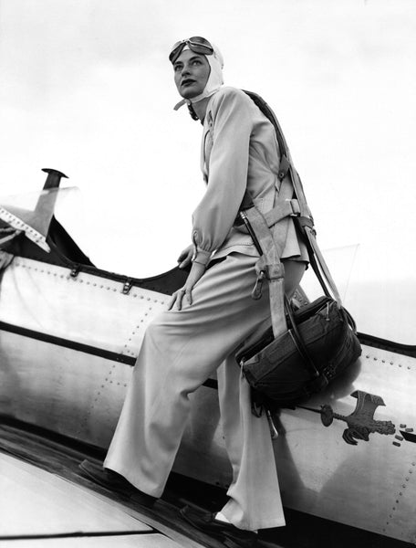 Bettie Bray, an aviatrix, standing on the wing of her airplane in 1949. -- Courtesy Cowlitz County Historical Museum / #2011.0070.0241