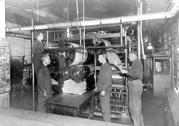 The Salem Evening News printing room, circa 1910s. -- Salem State University Special Collections