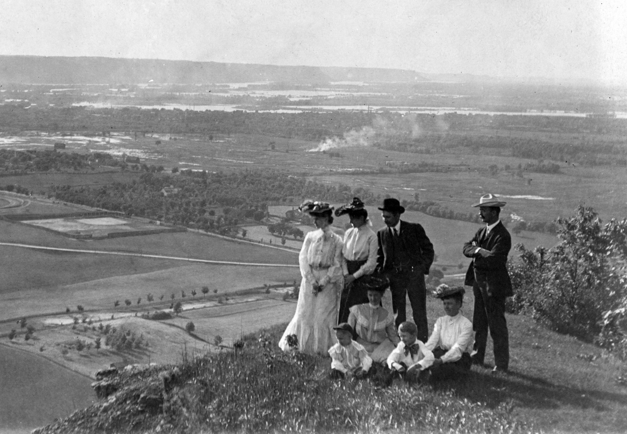 A group looking out at the countryside from Grandad Bluff on May 30, 1904. -- Courtesy University of Wisconsin-La Crosse / #2076