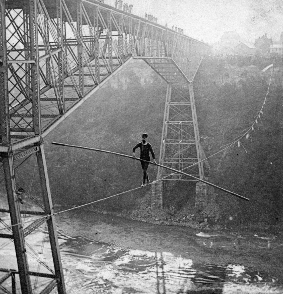 S.J. Dixon on his 7-8 inch wire, circa 1890. -- Niagara Falls Public Library