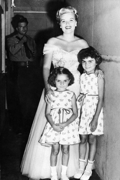 Patti Page with sisters, Joan and Linda DiPrima, back stage at the Frolics, Salisbury Beach, July 13, 1954. Police Officer, Joe Messina can be seen in back. -- Courtesy Joan Petersen