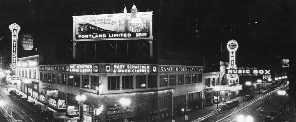 A view of the brightly lighted corner of Broadway and Washington in 1929.