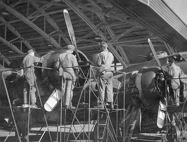 Mechanics working on a B-17 at the Sioux City Army Air Base, 1944. -- SIOUX CITY PUBLIC MUSEUM