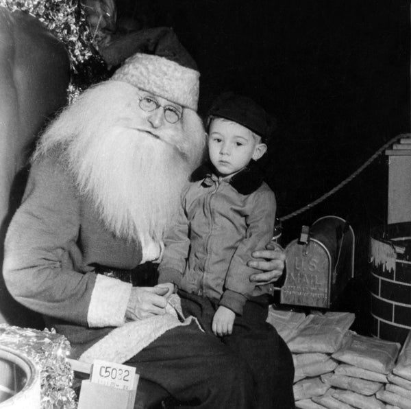 Young Ed Wiman’s first visit with Santa Claus at Goldblatt’s store in Hammond, 1949. -- BEVERLY (PAPP) WIMAN