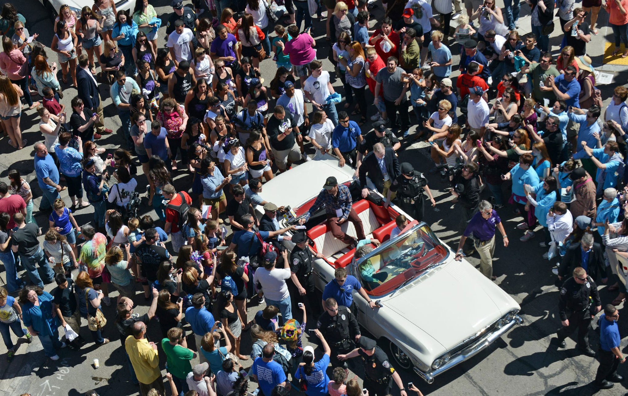 Rainn Wilson, from "The Office" is surrounded by fans during the parade from the University of Scranton to Courthouse Square, as part of "The Office" Wrap Party on May 4, 2013. -- Scranton Times-Tribune Archives