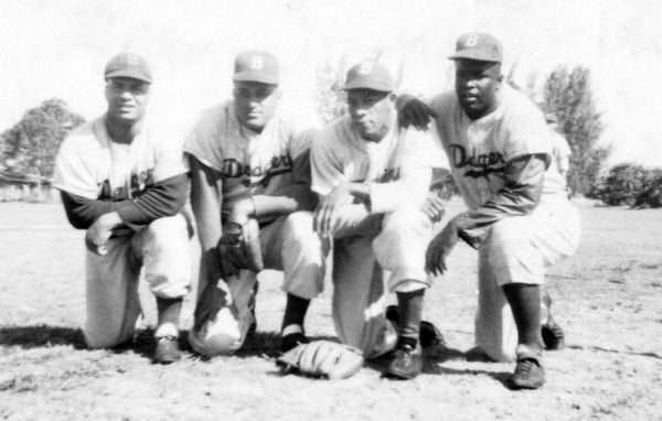 African-American players for the 1950 Dodgers. From left: catcher Roy Campanella, pitcher Don Newcombe, pitcher Dan Bankhead, infielder Jackie Robinson. -- Brady Ballard (Historic Dodgertown)