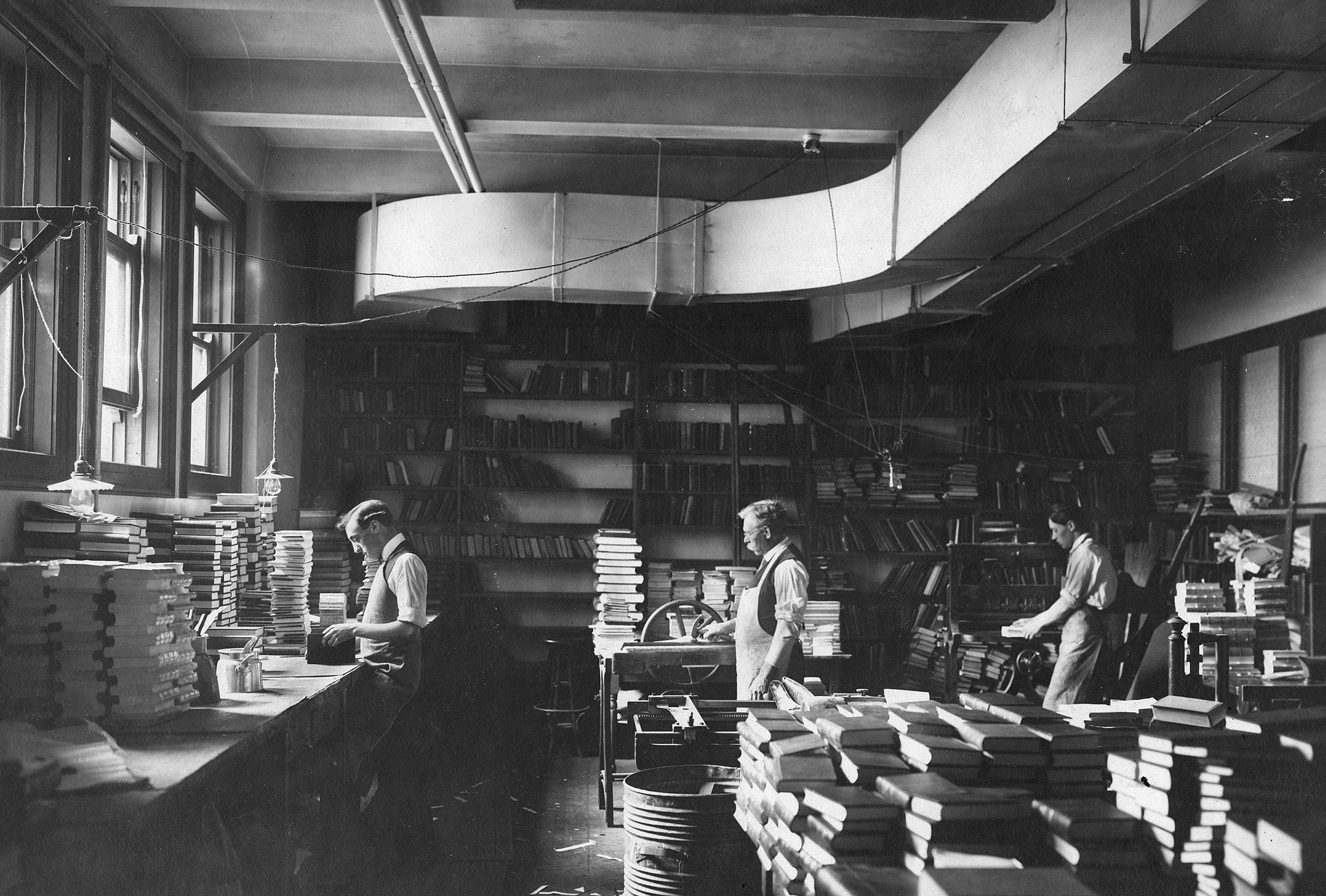 The bindery department at the Central Library, circa 1910, was a busy place and full of books. -- Courtesy Seattle Public Library