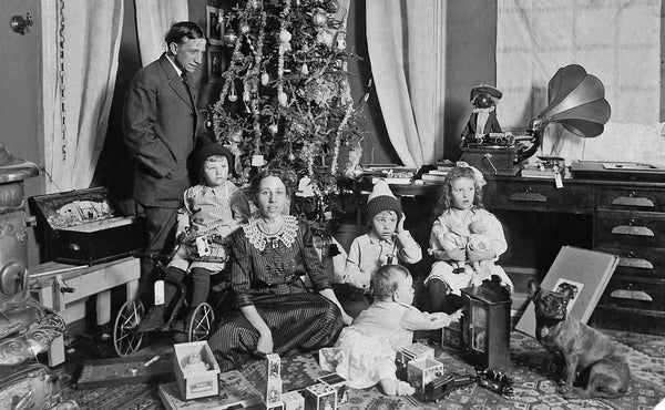 The Burgess family celebrating Christmas in 1913. Included in the photograph are Frank, May, Thomas, William, Edward, and Frances. -- DAVE BURGESS