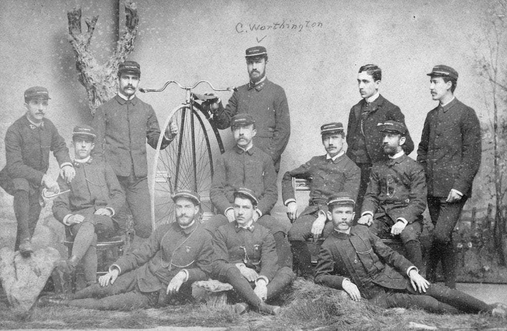 Baltimore High-Wheeler Bicycle Club in the 1870s. Claude Worthington is pictured standing right of the high-wheeler. -- Janice Kaifer