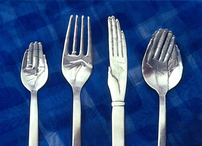 Hand that Feeds cutlery in sterling silver by Simone Walsh (circa 1999)