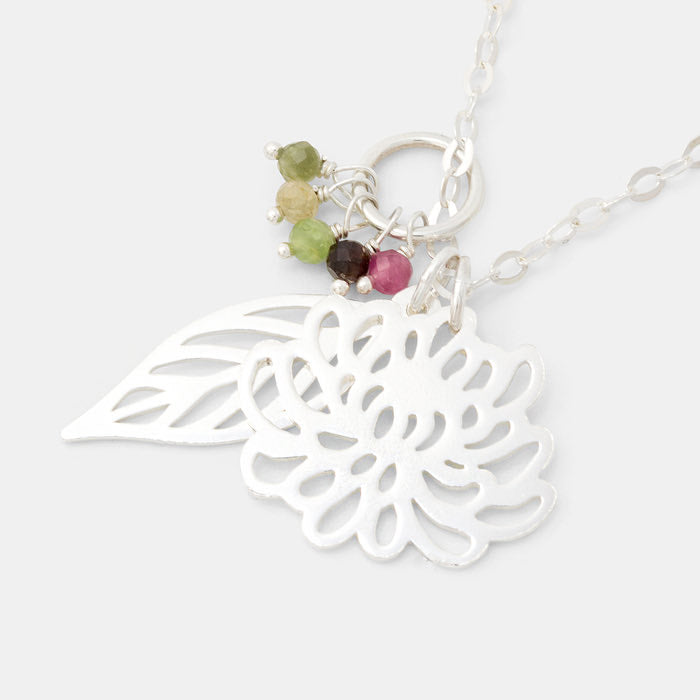 Chrysanthemum, leaf and tourmaline cluster necklace in sterling silver with tourmaline gemstones.