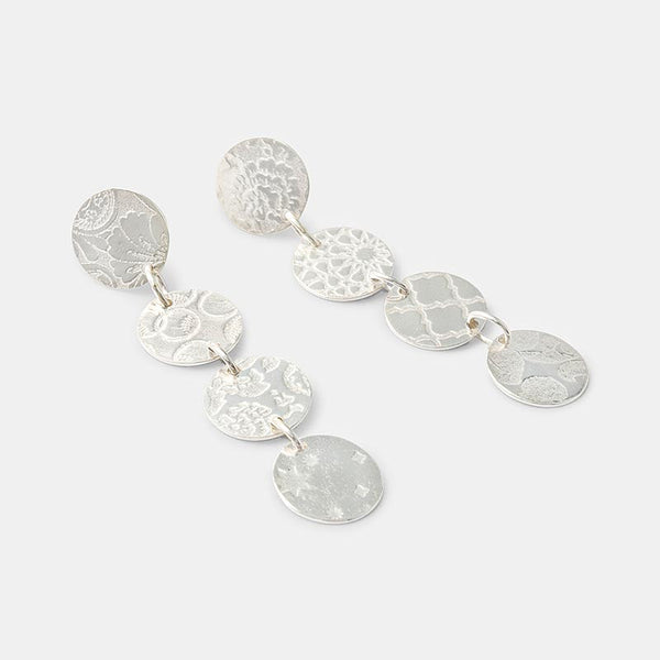 Dotted and patterned earring in sterling silver
