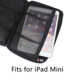 black travel organizer with mesh pocket holding an ipad mini. plentiful travel travel products.