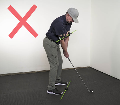 Photo of incorrect shoulder alignment when using the Swing Align golf swing aid