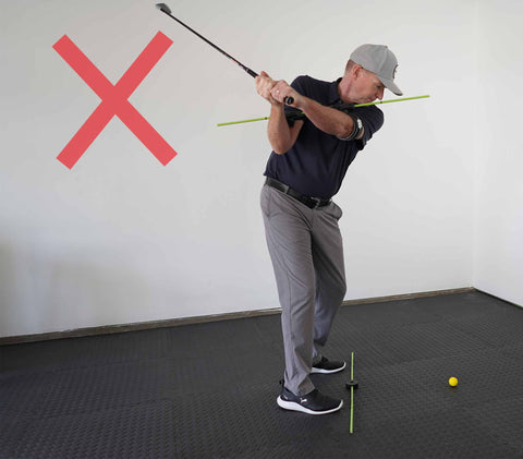 Photo of incorrect spine angle at the top of your golf swing