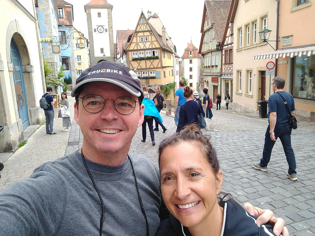 Photo of the author, Maria, and her husband Jim in Rothenburg ob der Tauber, a Medieval village in Bavaria