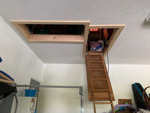 Attic Stairs and attic lift holes side by side garage view FL
