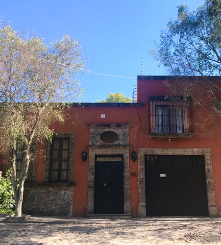adobe_pink_hacienda_gate_stone_architecture_san miguel_mexico
