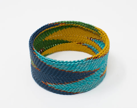 recycled_telephone wire_copper_yellow_blue_aqua_cuff_bracelet_flame_woven_handmade_san miguel_mexico