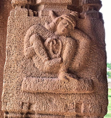 Yoga asana depicted on ancient Hindu temple in Karnataka, India