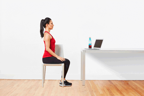 Seated Spinal Twist yoga stretch, demonstrated.demonstrated.