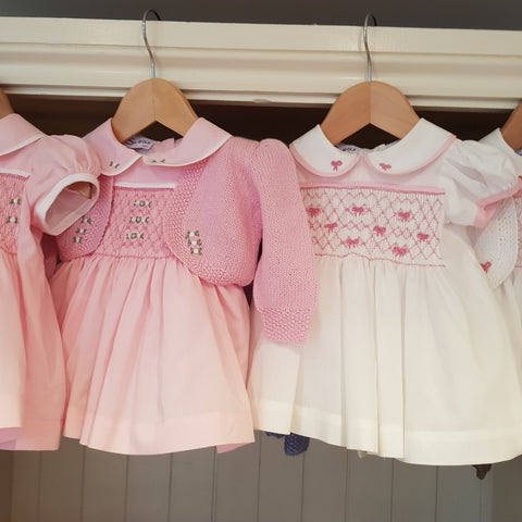 Sue Hill hand smocked and hand embroidered baby dresses
